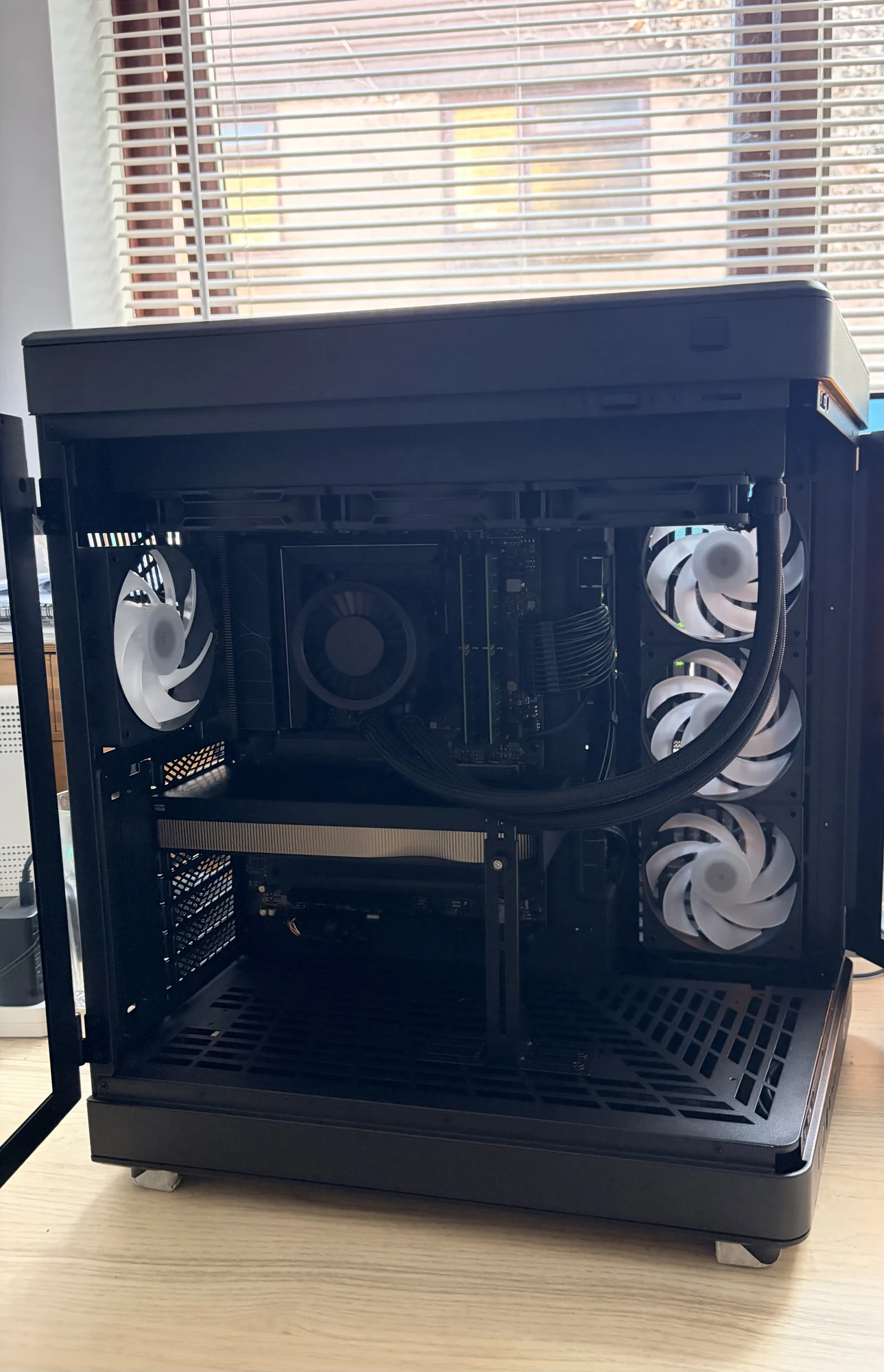 Oneirix's local research workstation, showing its GPU, cooling system and model evaluation hardware.